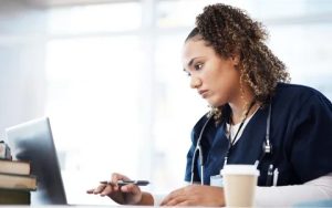 woman uses laptop